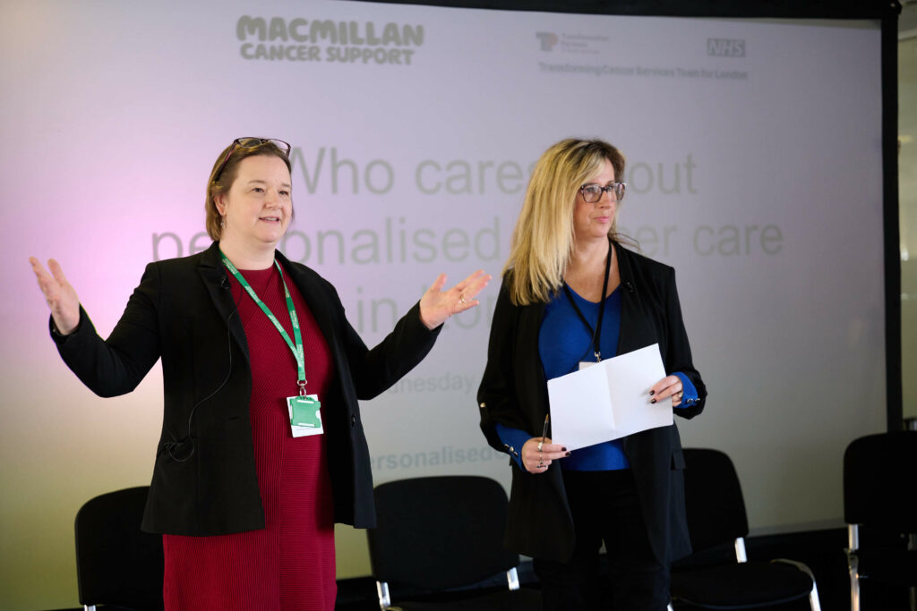 Emma and Philippa, workshop organisers on stage.