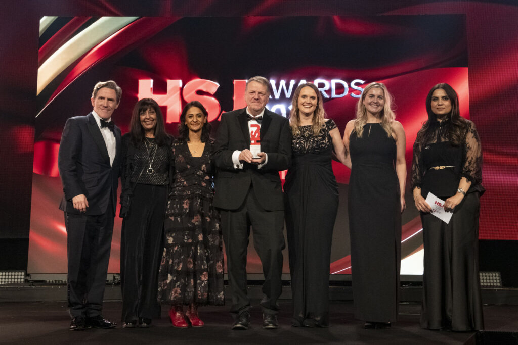Members of the TPHC, NHS North Central London ICB and Whittington Health collaborative partnership collecting their HSJ Award for Reducing Inequalities and Improving Outcomes for Children and Young People.